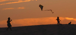 girls-flying-a-kite